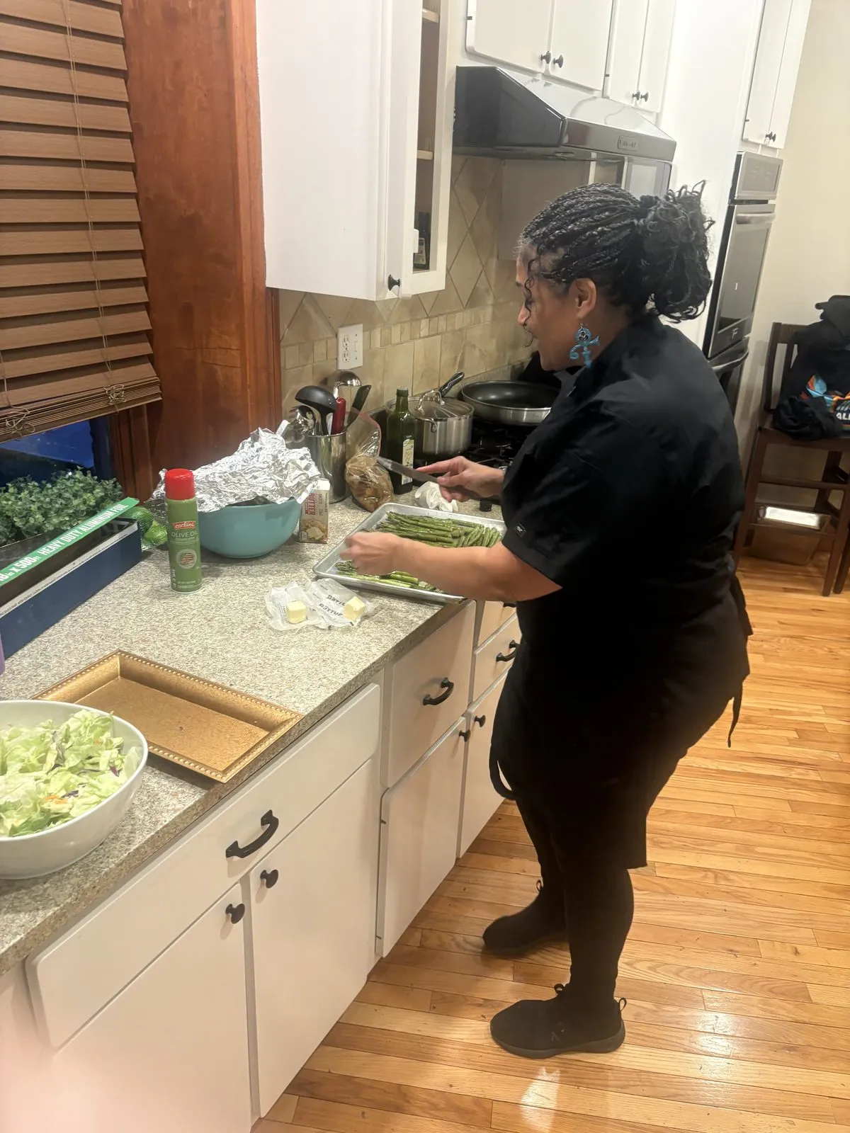 Chef Shonte preparing a meal in a private kitchen